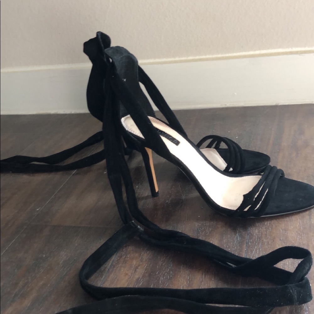 Lace up black heels. NEVER WORN